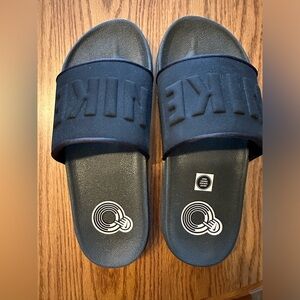 Nike off court slides. Women’s sz 8  NWOT.